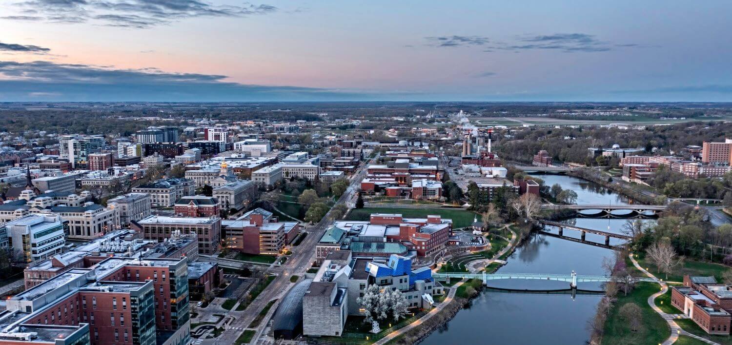 Aeriel perspective of Iowa City and the Iowa River at sunrise Aeriel perspective of Iowa City and the Iowa River at sunrise